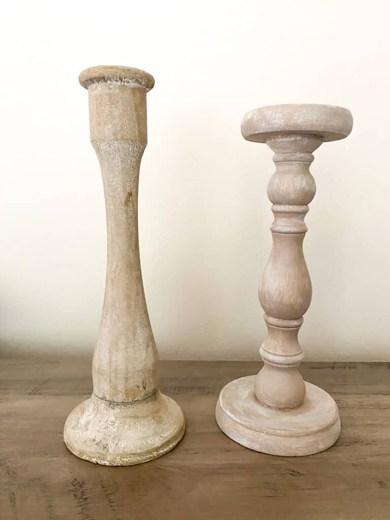 The candle holder on the left is what I used an inspiration to make the candle holder on the right. Check out how I turned these dark stained candle holders into some modern farmhouse style, faux bleached wood upcycled candle holders only using paint!