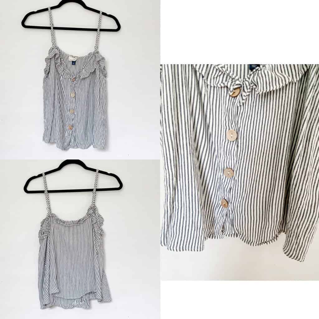 A light blue and white striped tank top with wood buttons down the front and a ruffled neckline.