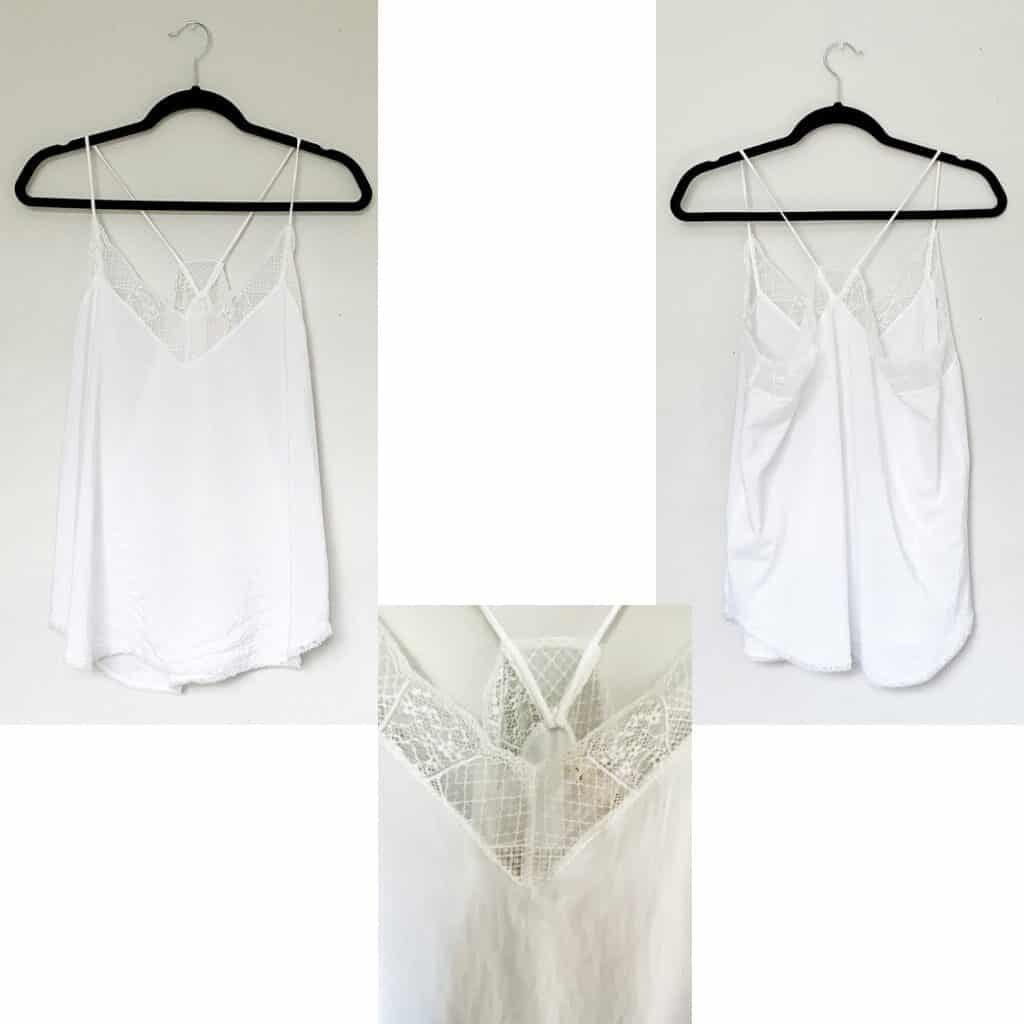 A white camisole with lace trim along the neckline.