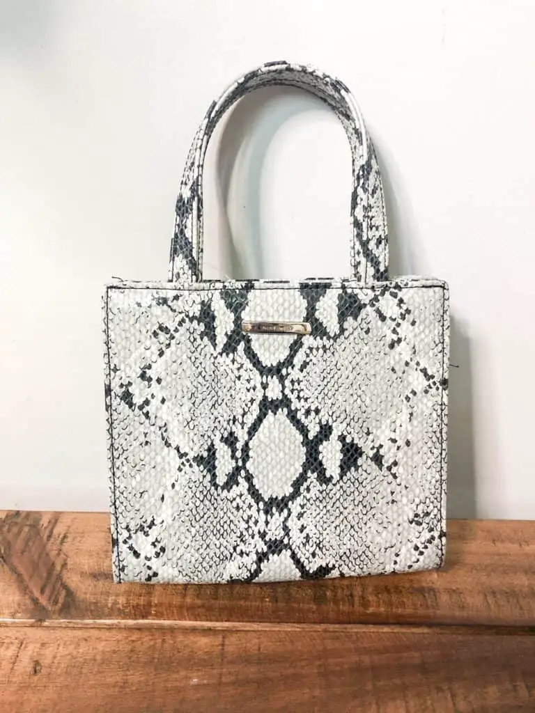 Fall Thrift Haul | This mini snakeskin handbag is very trendy for fall. It is the perfect little bag for a night out.