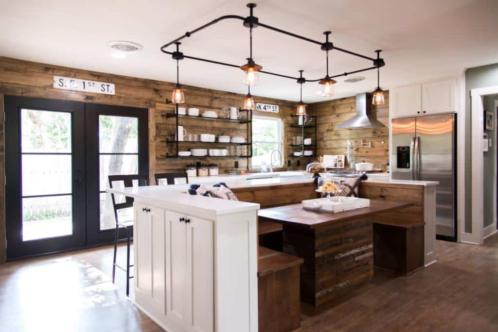 Fixer Upper kitchen. This is a mix of industrial and rustic. Use warm toned woods mixed with metals to get a similar feel