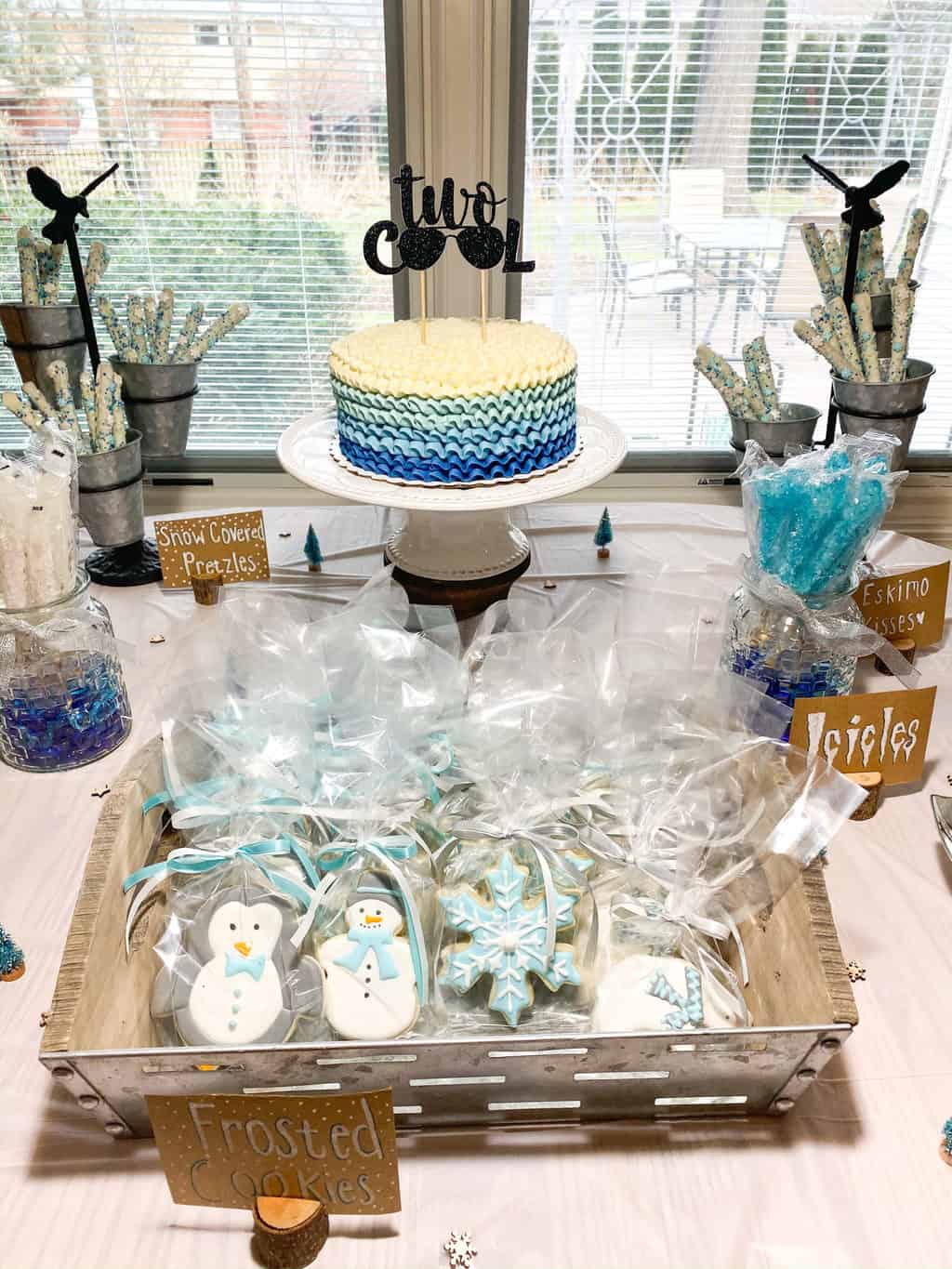 This two cool birthday party is a winter themed second birthday party with a touch of cool kid. We had winter themed food and decorations as well as glow stick glasses and bracelets. Check out everything I used for my son's Two Cool party!