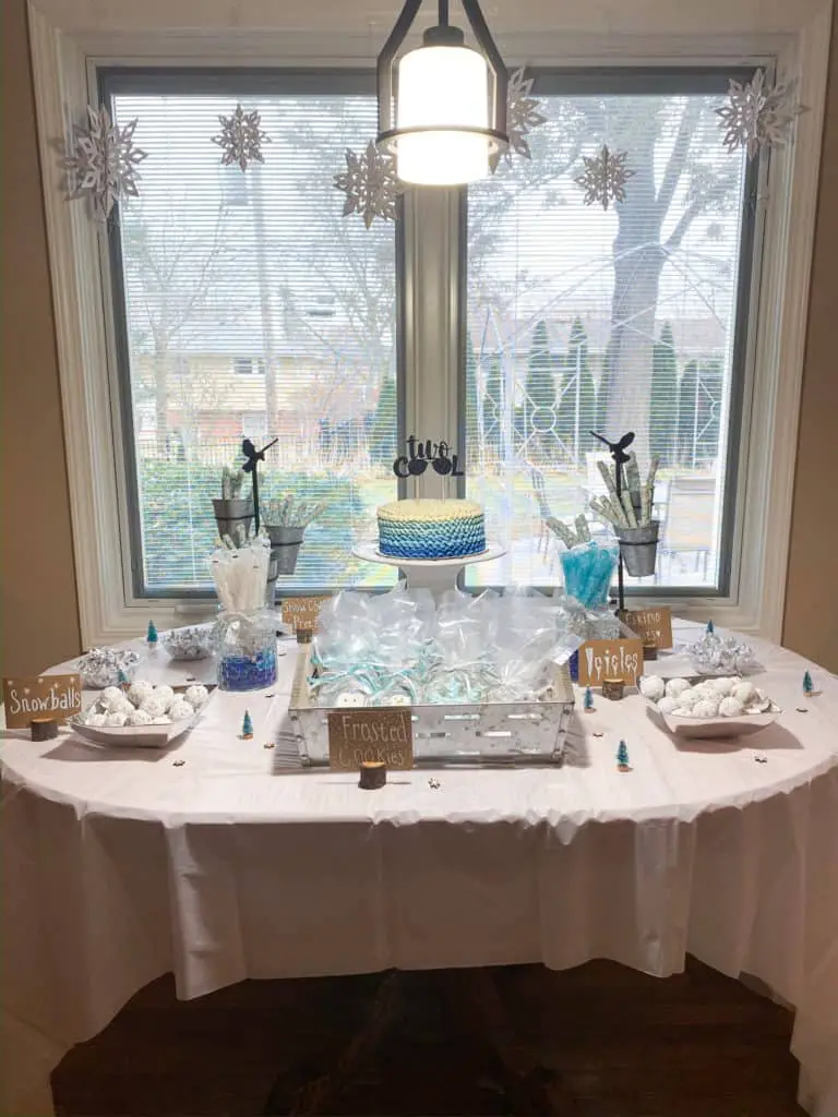 This two cool birthday party is a winter themed second birthday party with a touch of cool kid. We had winter themed food and decorations as well as glow stick glasses and bracelets. Check out everything I used for my son's Two Cool party!