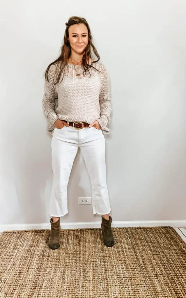 These thrifted fall basics are perfect for all your casual fall outfits. These white straight leg jeans with a cropped raw hem paired with this gray open knit sweater, brown belt, and brown booties are the perfect outfit for fall.