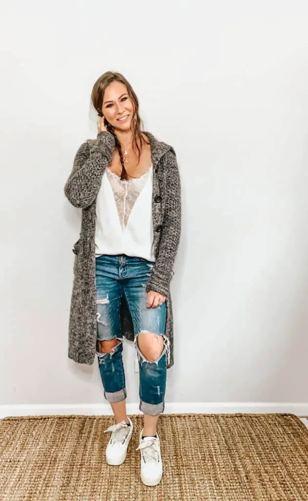 These thrifted fall basics are perfect for all your casual fall outfits. This gray and white marled duster sweater can be worn with a white silk and lace camisole, ripped jeans, and some white sneakers.
