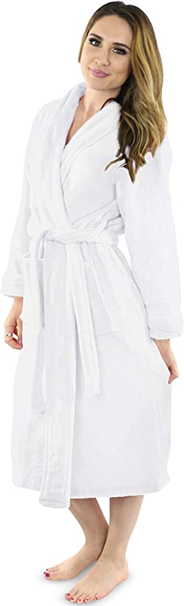 A woman wearing a calf length white fluffy bathrobe.