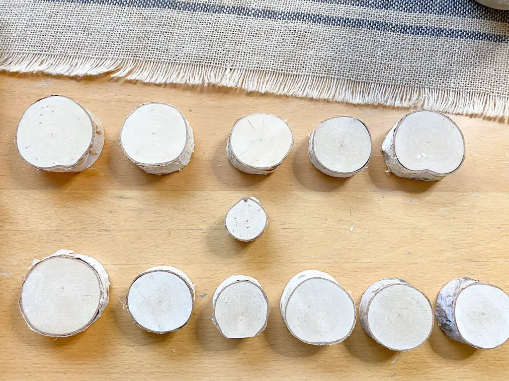 12 assorted sized birch brand slices.