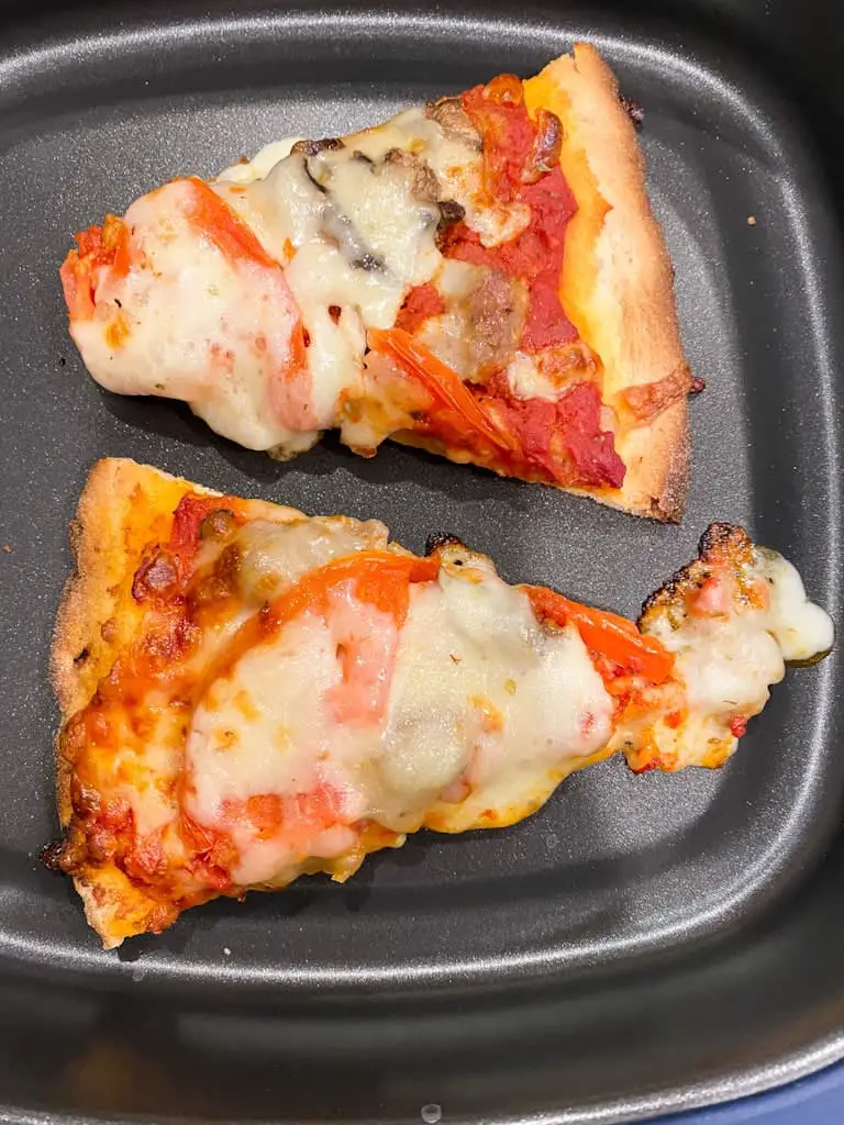 Reheated pizza in the Tupperware MicroPro Grill for the microwave.