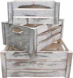3 white distressed wood crates, perfect for pantry organization.