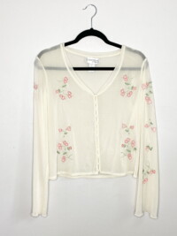 Thrifted fall basics including this cream, sheer button down top with pink floral embroidery and bell sleeves.
