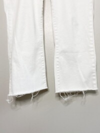 Close up showing the raw hem of the the Ralph Lauren straight leg jeans.