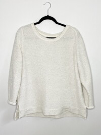 A white textured sweatshirt with rolled sleeves is one of my favorite thrifted fall basics.