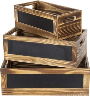 Wooden crates with chalkboard signs for DIY pantry organization.
