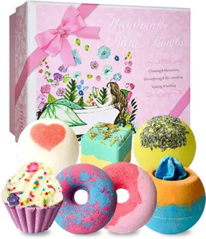 A set of 7 assorted bath bombs in a variety of scents, colors, and shapes. A great gift for her that would be the perfect addition to a relaxation gift basket.