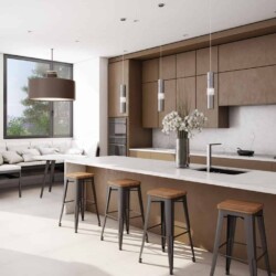 Photo shows a modern style kitchen with a medium dark wood cabinet with a smooth front and no cabinet pulls, a white marble countertop, wood and metal stools and minimal accessories. There is modern style metal lighting over the island and a large breakfast nook built in to the corner under a window.