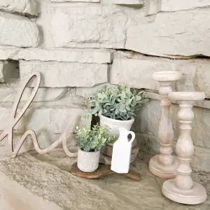 Want some modern farmhouse style, bleached wood candle holders without having to go through the whole sanding, stripping, and staining process? Find out how I turned these upcycled candle holders which were super dark stained, into these gorgeous faux bleached wood candle holders using only paint!