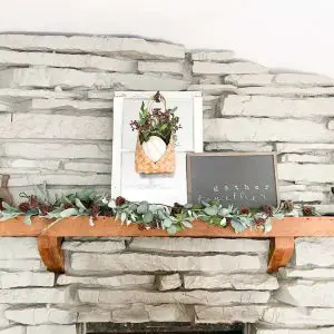 Fireplace mantle with muted fall decor. The perfect way to add some color to your neutral fall decor